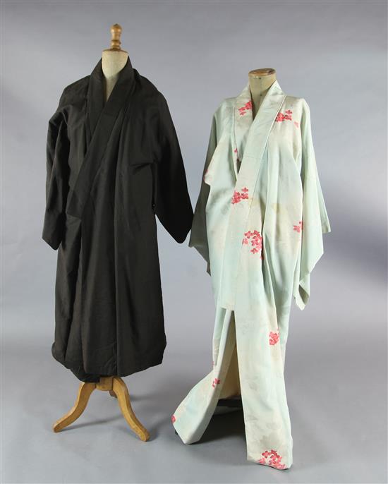 Madame Butterfly: A rail of eleven short multi-coloured woven and printed kimono jackets and twelve full length kimonos
